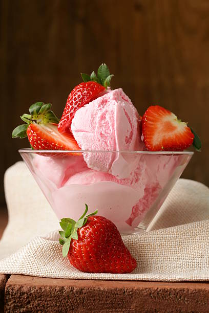 istock strawberry ice cream served with fresh berries 477826249