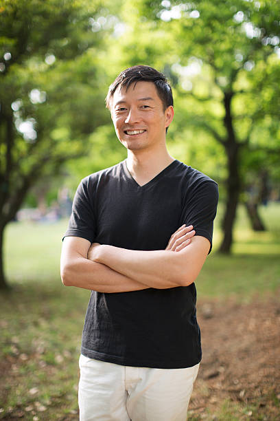 istock Japanese Man In A Park 477827534