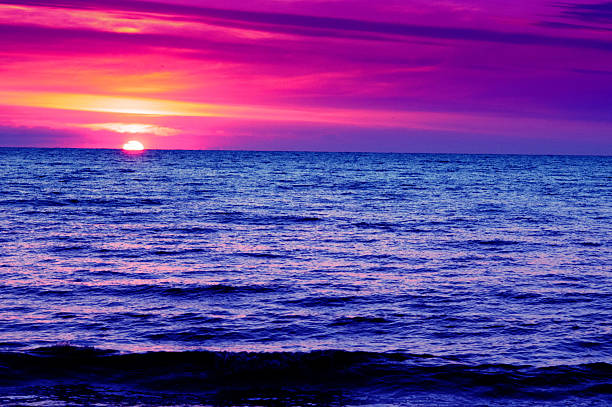 istock Amazing purple sunset over sea 477827898