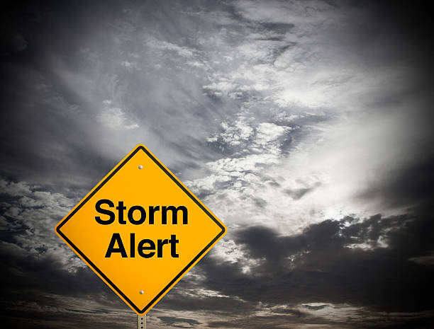 Storm Alert A sign that says "Storm Alert." tropical storm photos stock pictures, royalty-free photos & images