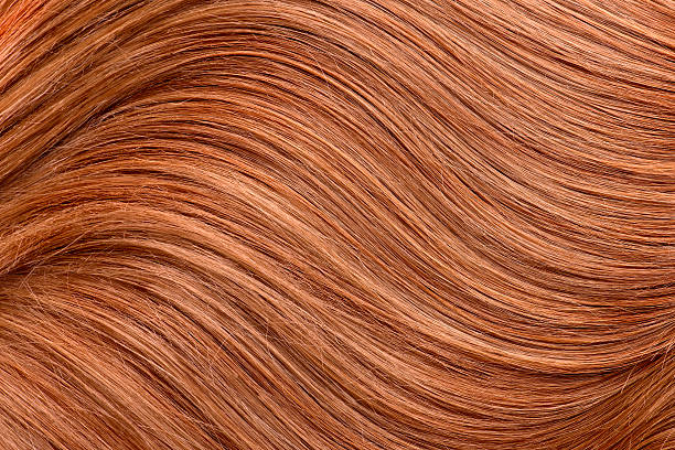 Long red human shiny hair Wavy red human hair background dyed red hair photos stock pictures, royalty-free photos & images
