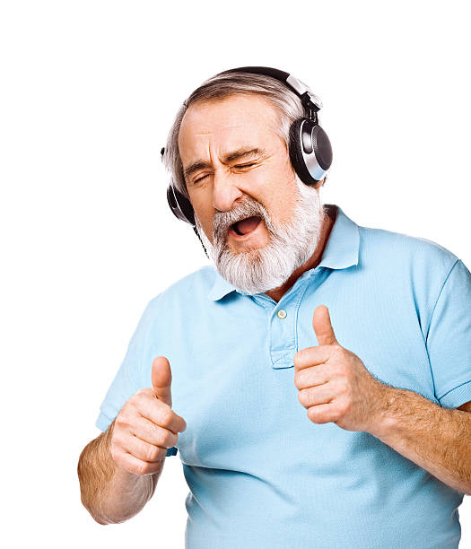istock Excited old man listening to music 477829732