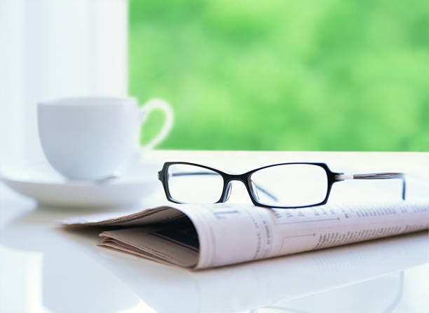 istock newspaper and glasses 477829841