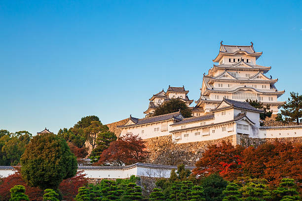 Himeji, Japan - October 25 2014: Himeji Castle is regarded as the finest surviving example of prototypical Japanese castle architecture, comprising a network of 83 buildings with advanced defensive systems from the feudal period