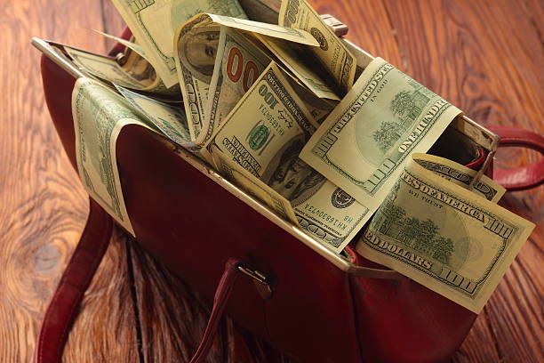 istock bag full of money 477832172