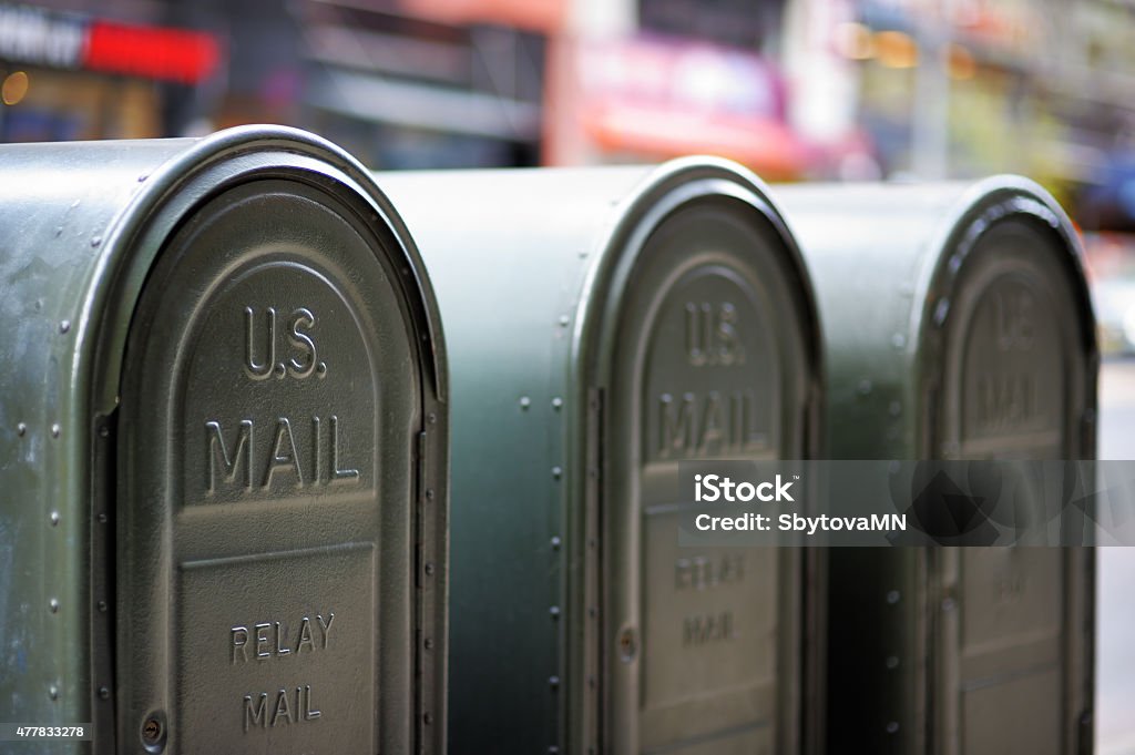 Outdoors mailboxes Row of outdoors mailboxes in NY, USA Postal Worker Stock Photo