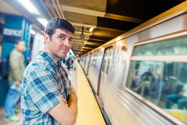 istock NYC Man waiting for Subway Train Public Transportation on Platform 477835002