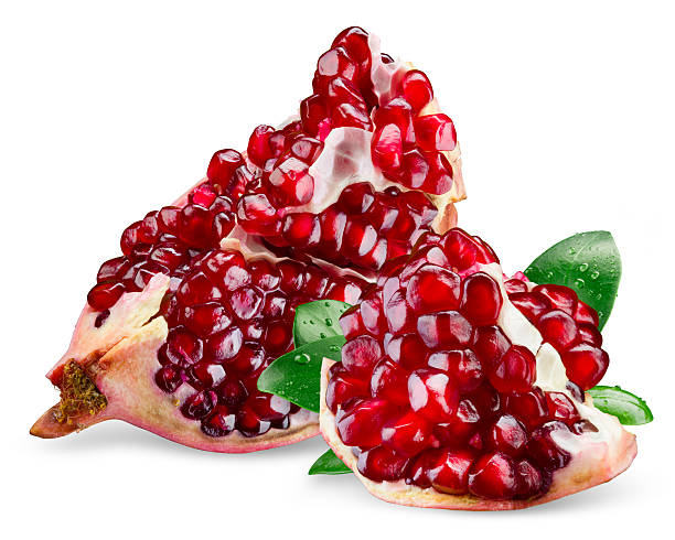 istock Pomegranate piece with leaves isolated on white background. 477836172