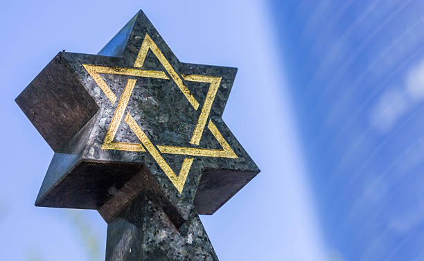 istock Jewish cemetery: Star of David on the tombstone 477836598