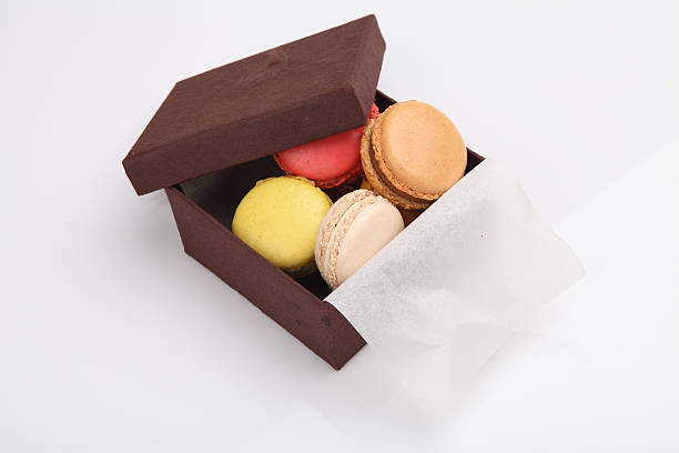 istock Colorful macaroon in close up isolated on white background 477836615