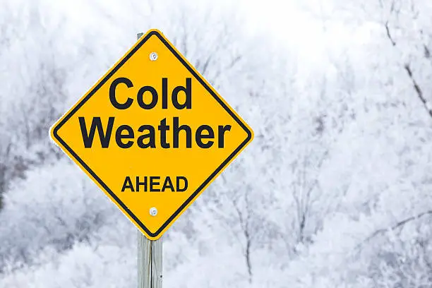 Photo of Cold Weather Ahead Road Warning Sign