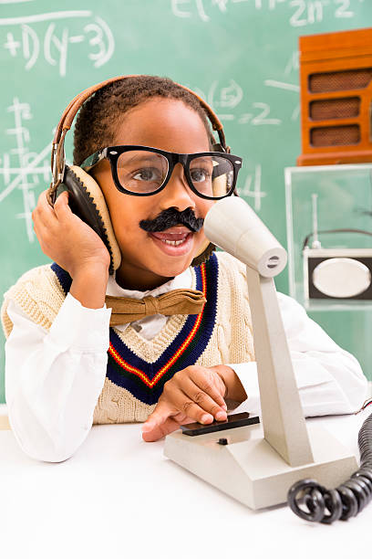 deportes: retro radio presentador. medios de comunicación. little boy. - child back to school mustache african ethnicity fotografías e imágenes de stock