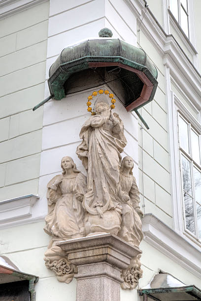 istock Statue of Saint or Prayer. Decoration element of house. 477840586