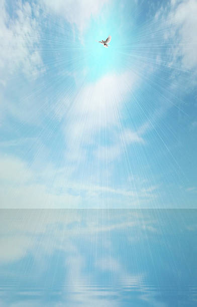 istock light beam and holy spirit 477841169