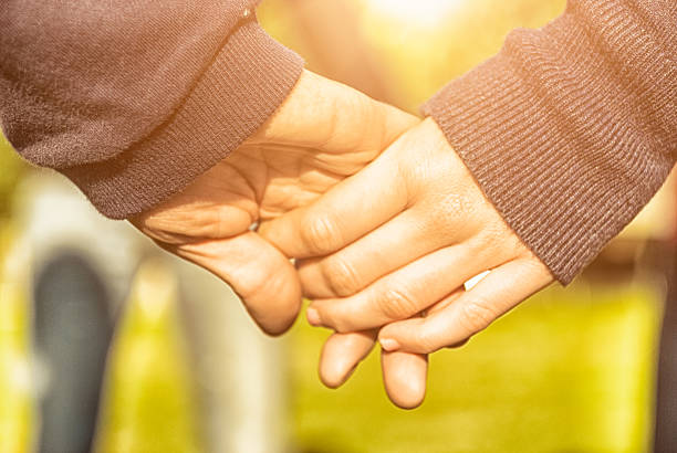 istock Holding hands - teenagers 477841429