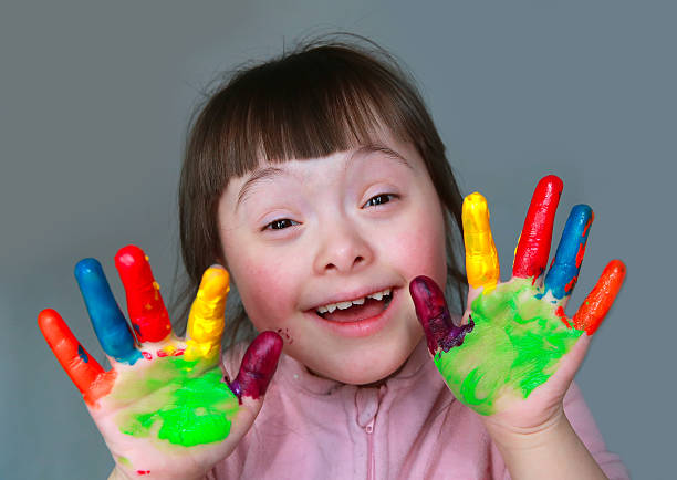 istock Cute little girl with painted hands 477841456