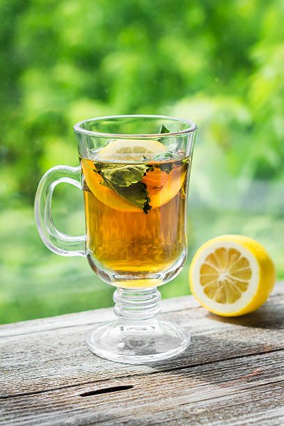 istock green tea with mint and lemon in a glass mug 477842390