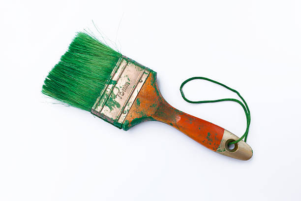 istock Dirty green brush on white background 477843034