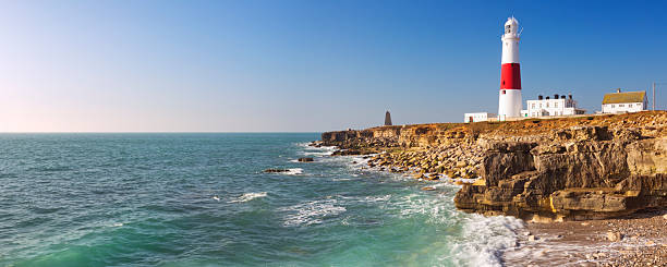 istock Portland Bill Lighthouse in Dorset, England on a sunny day 477843132
