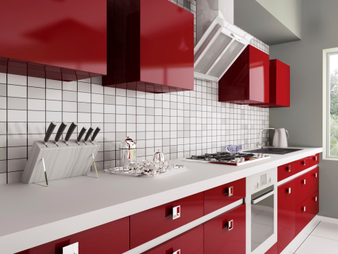 Modern red kitchen with sink,gas stove interior 3d. Photo of tree behind the window is my own work, all rights belong to me.