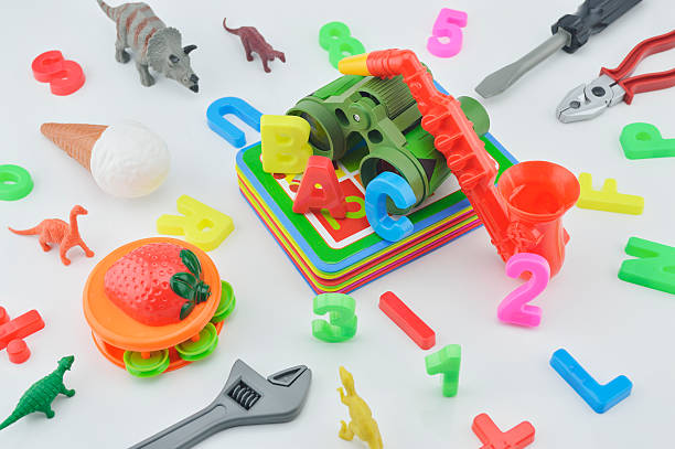 istock Colorful plastic toys on white background, kid education concept 477843318
