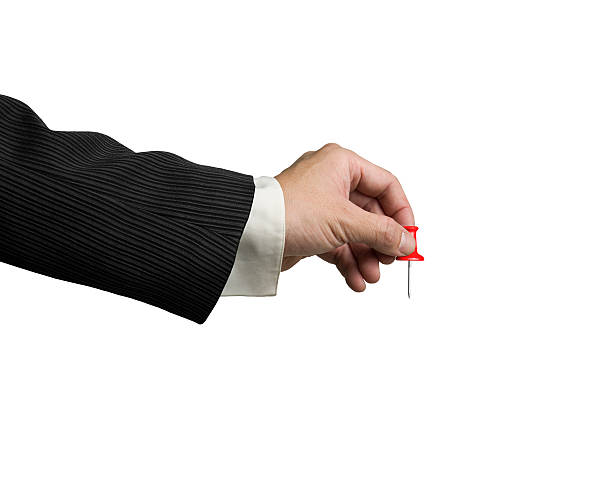 istock Male hand holding red pushpin 477843604