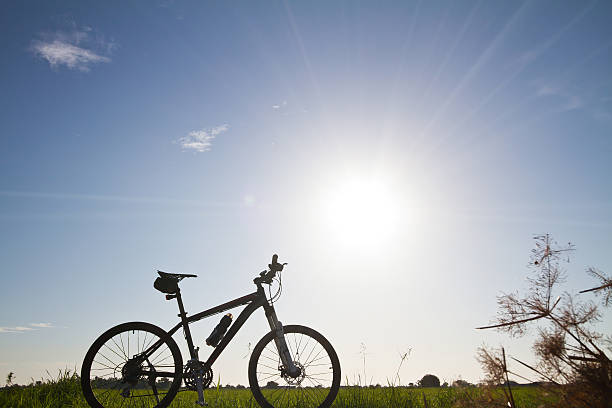 istock Mountain bike silhouette in sunrise 477843778