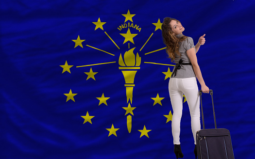 young beautiful woman is traveling to indiana