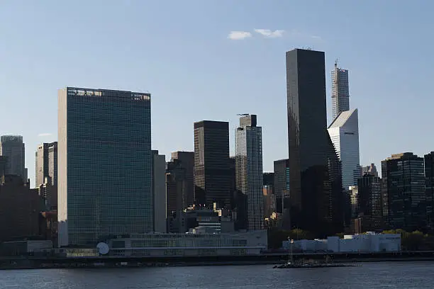 Photo of United nations by the river