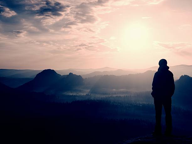 istock Hiker on sharp corner of sandstone rock in rock empires 477847694