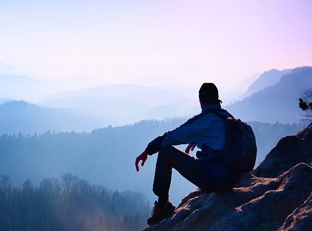 istock Tourist with sporty backpack sit  mountain 477847700