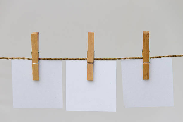 istock post it reminders and clothespins attached to a rope 477847930