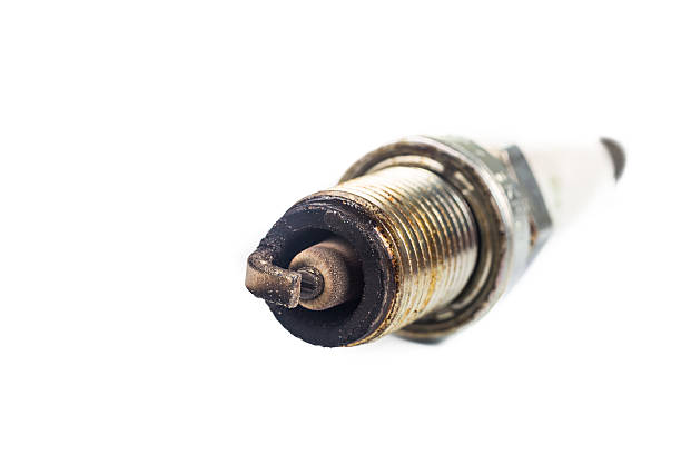 istock Close up of used spark plugs focus on electrode deposits 477848608