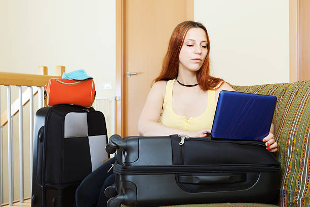 istock woman  reserving hotel online in  internet 477849101