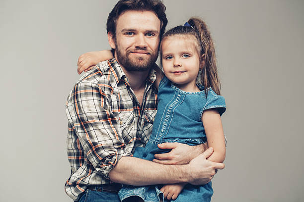 istock Family father with daughter portrait studio 477849506