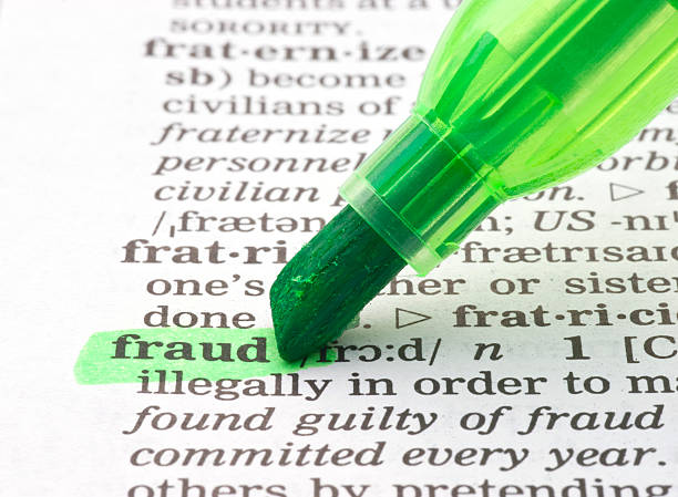 istock fraud definition highligted green in dictionary 477850927