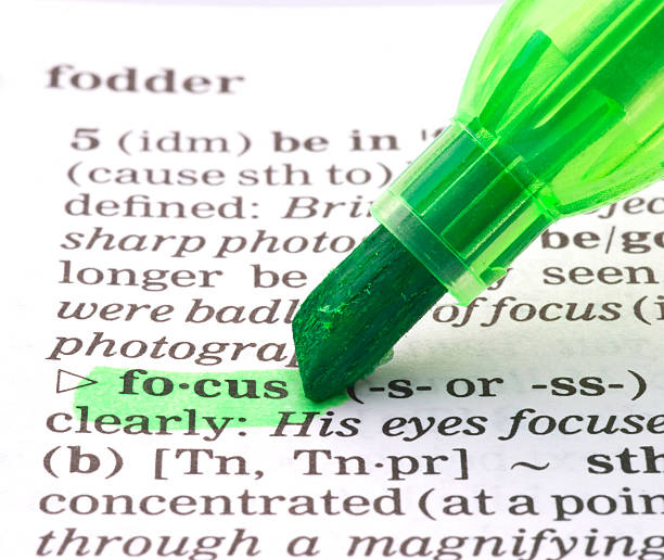 istock focus definition highligted green in dictionary 477850955