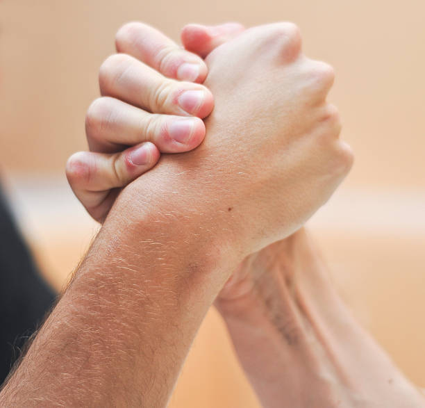 istock Arm Wrestling with two white people in competition 477851481