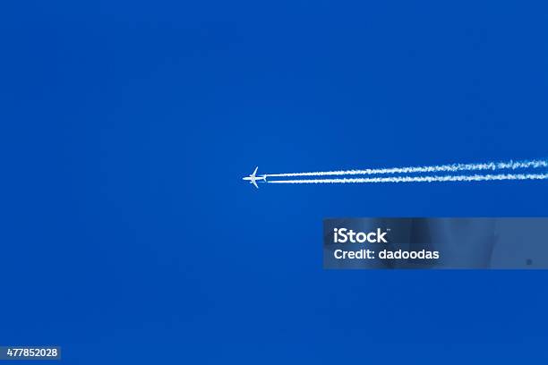 Jet Airplane On Blue Sky Stock Photo - Download Image Now - 2015, Air Vehicle, Airplane