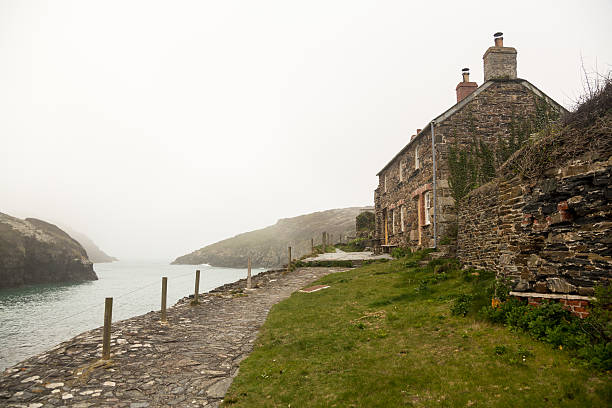istock Harbour of Port Quin in Cornwall 477852188