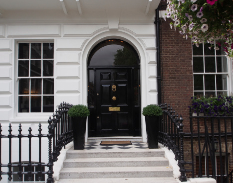 Elegant front door of townhouse in London or Manhattan