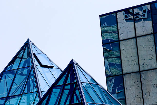 Buildings of glass and steel with pyramid shapes stock photo