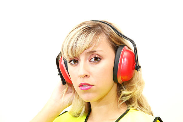 istock female wearing ear muff 477852719