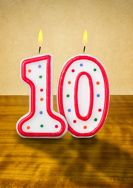 Burning birthday candles number 10 Burning birthday candles number 10 10 11 years photos stock pictures, royalty-free photos & images