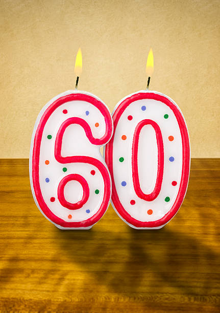 istock Burning birthday candles number 60 477853278