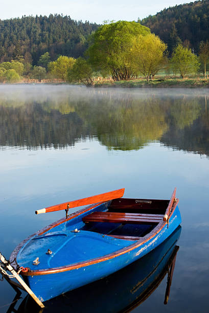 istock Landscape by the river with boat 477856158