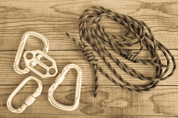 istock Mountain gear for climbing on wooden background 477856598