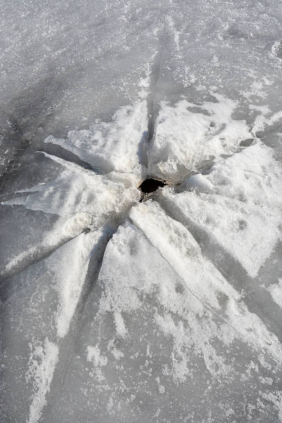 istock Cracked ice. Picture can be used as a background 477856892