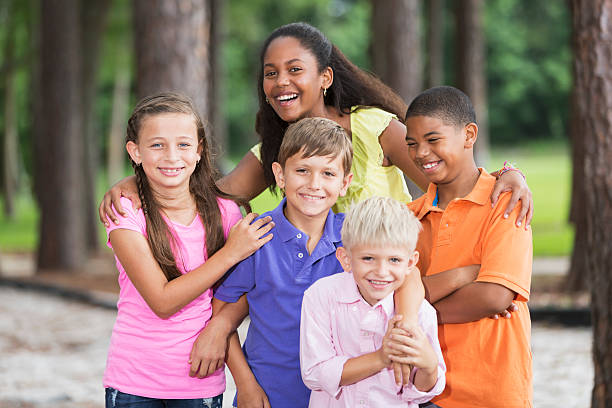 istock Group of children in park 477857773