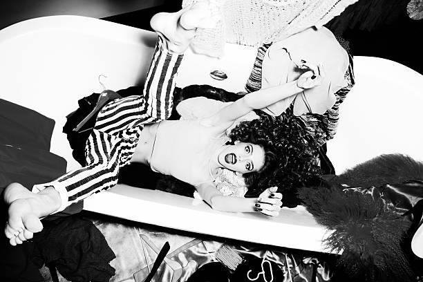 istock Showy sexy young woman in bath 477857896